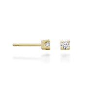 Orecchini punto luce 0,06 ct oro giallo
