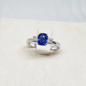ANELLO ORO BIANCO CON DIAMANTI E ZAFFIRO