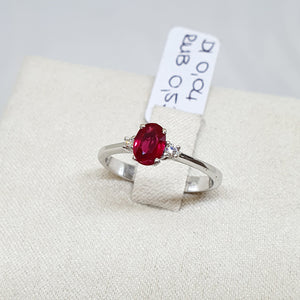ANELLO IN ORO BIANCO CON 2 DIAMANTI E RUBINO