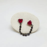Mono orecchino con rubini e diamanti neri
